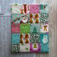 Image 1 of "Sleigh Bells Ring” Patchwork Quilted Book Sleeve