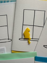 Image 5 of Cat Sitting In A Window