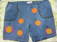 Image 1 of orange jorts
