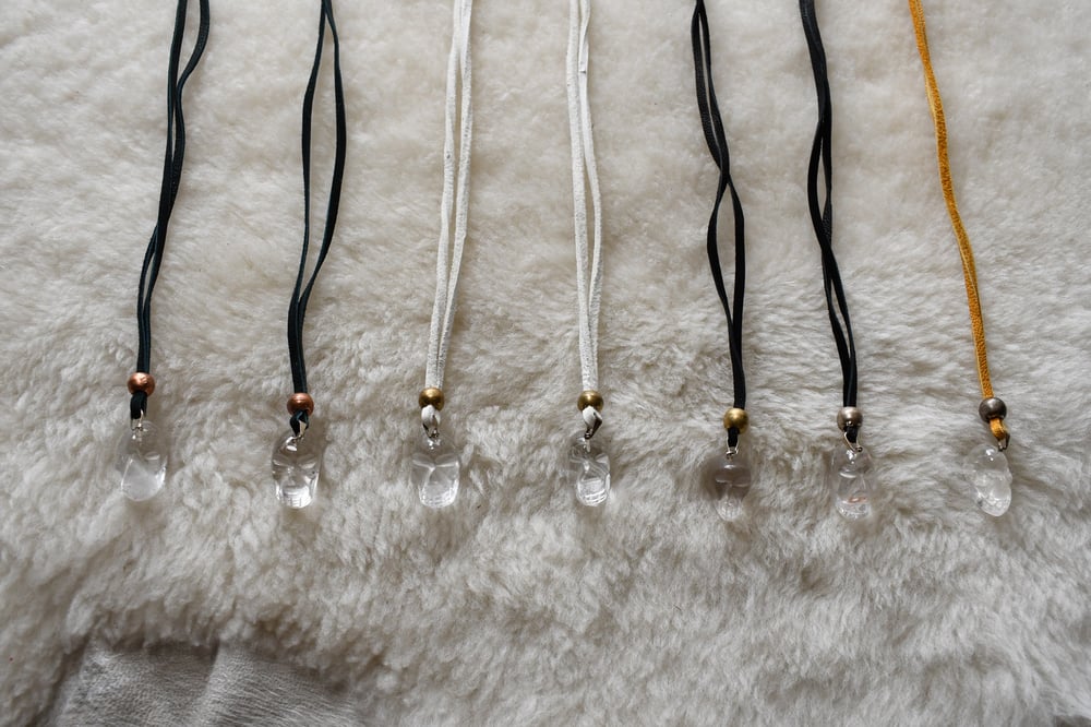 Image of CRYSTAL SKULL PENDULUMS