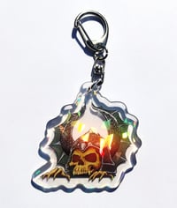 Image 2 of Skull peeker cystal clear keychain