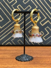 Image 3 of Gold plated white cotton and rainbow glass bead Afghan tassel tunnel earrings