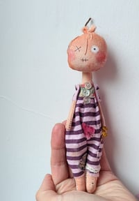 Image 1 of Pumpkin in dungarees 