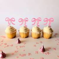 Image 3 of Moños Coquete Rosa Cupcake Toppers Sets de 12 y 24