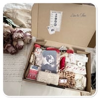 Image 4 of box of vintage french lace and other haberdashery items.