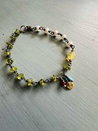 Image 1 of pearl and gemstone charm bracelet . sterling and 22k gold