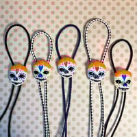 Image 1 of Bolo Marigold Catrinas