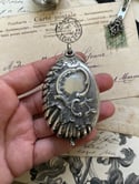 Pendentif miroir de châtelaine plaqué argent, XIXème siècle