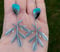 Image of Extra Large Rue Leaf Blue Opalized Wood Statement Dangle Earrings