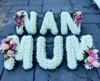 Image 2 of Foliage edged tribute 