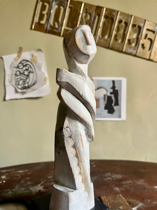 FEMALE ABSTRACT FIGURE SCULPTURE