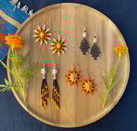 Image 1 of Entre Dos Mundos Pt.1 