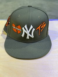 Image 1 of Never Defeated Olive