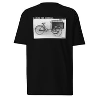 Image 1 of Caring for animals since 1919 premium heavyweight black tee