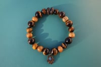 Image 3 of Tigers eye Hamsa