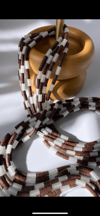 Image 1 of Brown Glow