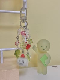 Image 1 of strawberry seal clay keychain