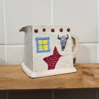 Image 4 of woodstock scented adobe style candle