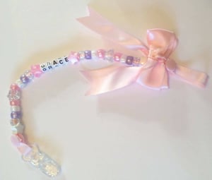Image of dummy / toy clip  you choose colour and name 