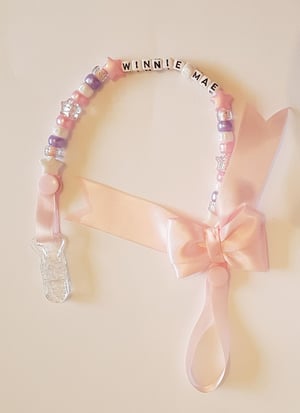 Image of dummy / toy clip  you choose colour and name 