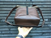 Image 4 of Leather backpack with waxed canvas roll to close top and double outside pocket