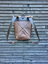 Image 5 of Leather backpack with waxed canvas roll to close top and double outside pocket
