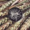 Hare in the wheat enamel pin