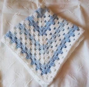 Image of Crochet pram or cot blanket