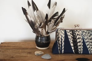 Image of Feather stripe clutch purse