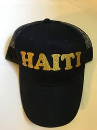 Image 1 of Black Hat with Gold Haiti