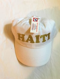 Image 1 of White Hat with Gold Haiti