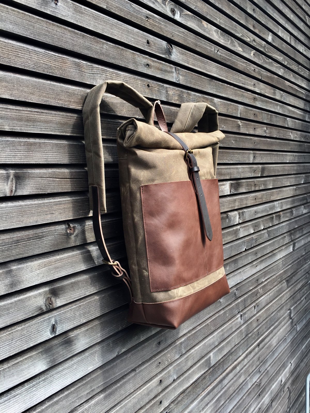 Image of Waxed canvas backpack / rucksack with leather outside pocket and bottom, unisex
