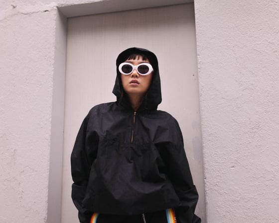 Image of 1/2 zipped Windbreaker