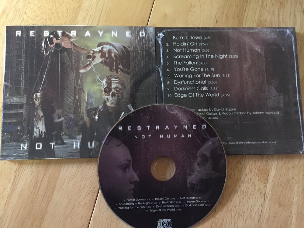 Restrayned - "Not Human" CD
