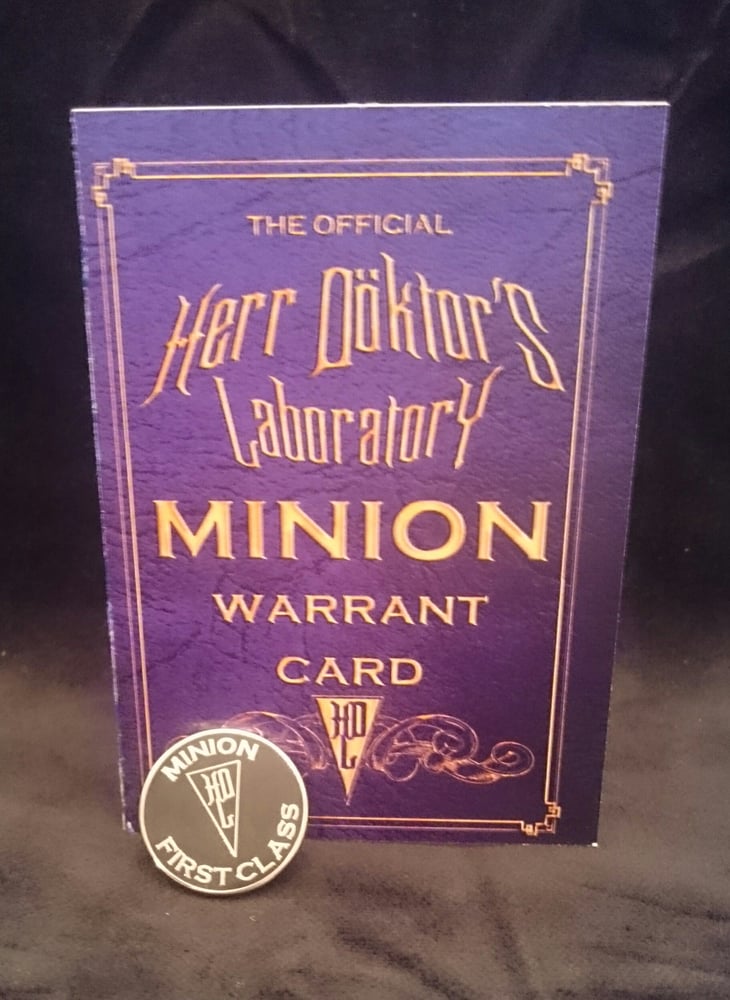 Image of Herr Döktor's OFFICIAL Minion Enamel Badge and Signed Warrant Card