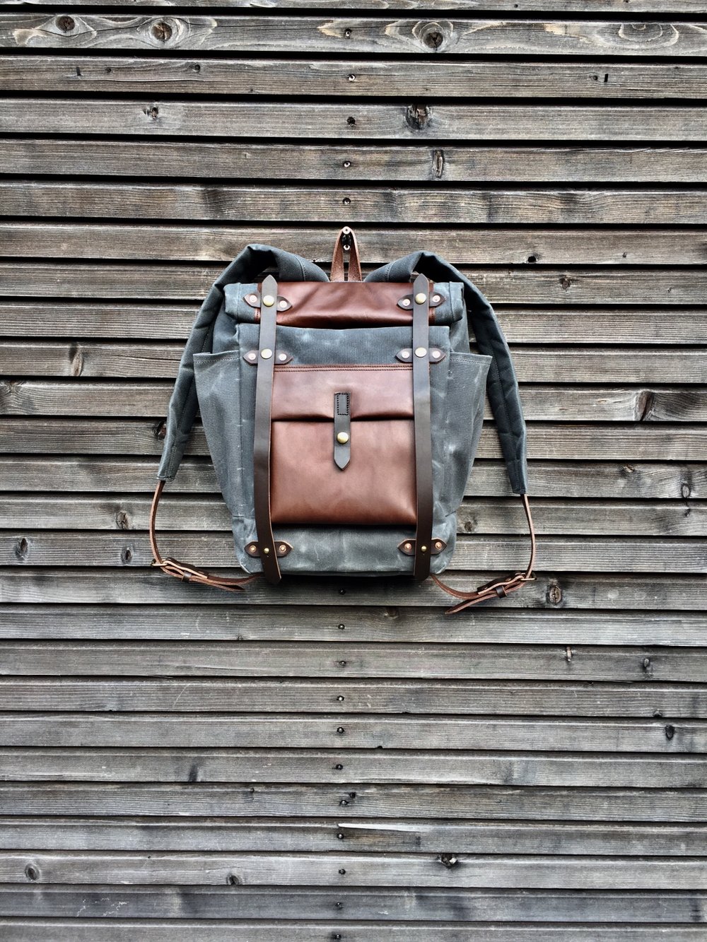 Image of Backpack in waxed canvas,  medium size / Hipster Backpack with roll up top and double bottle pocket