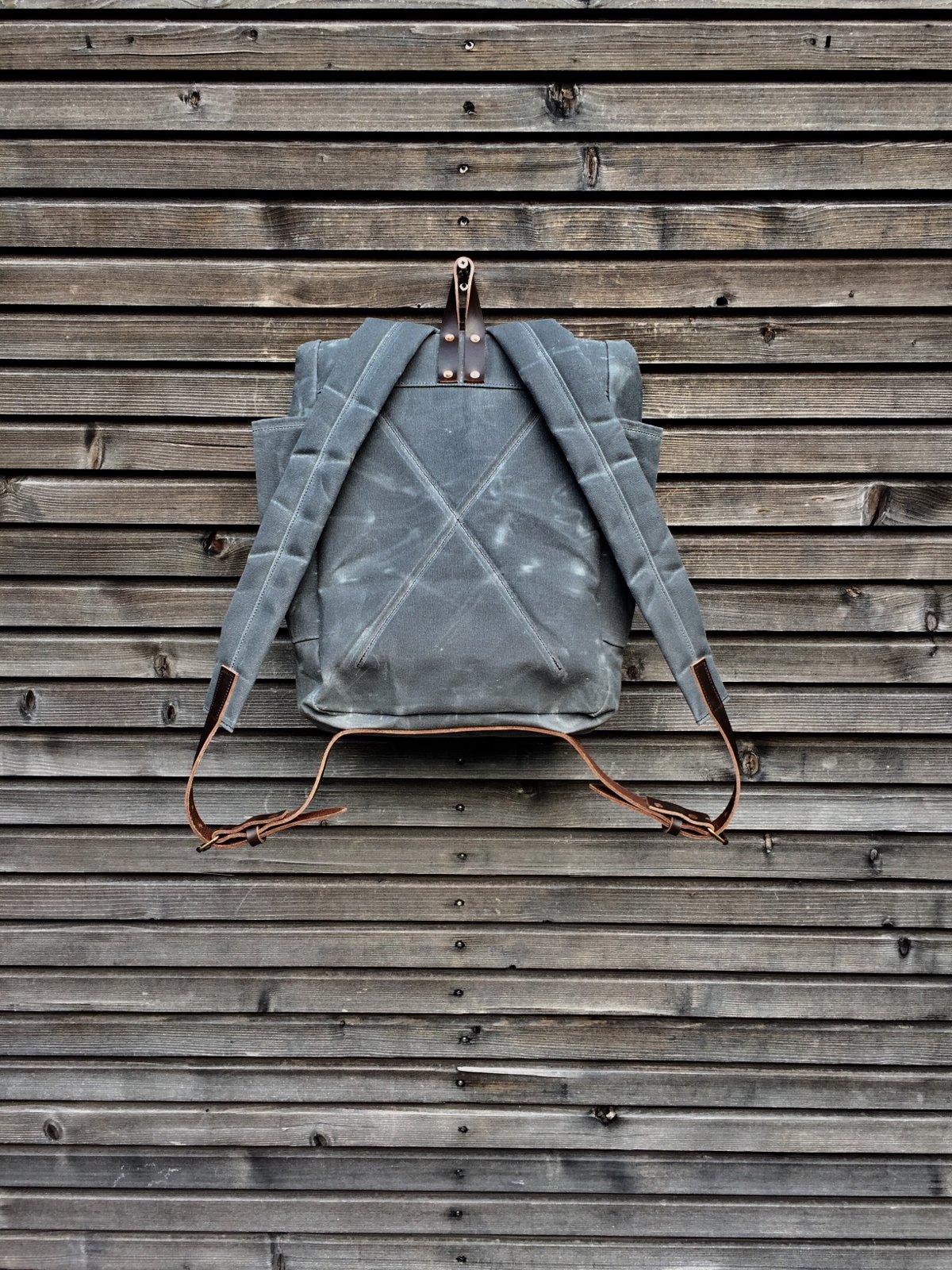 Image of Backpack in waxed canvas,  medium size / Hipster Backpack with roll up top and double bottle pocket
