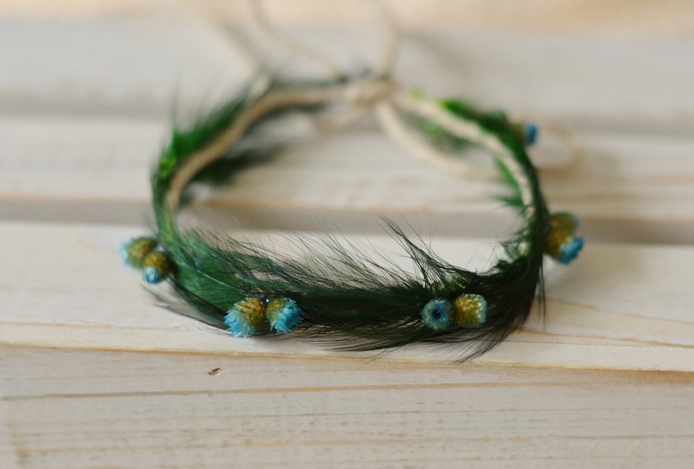 Image of Feathers and flowers halo emerald