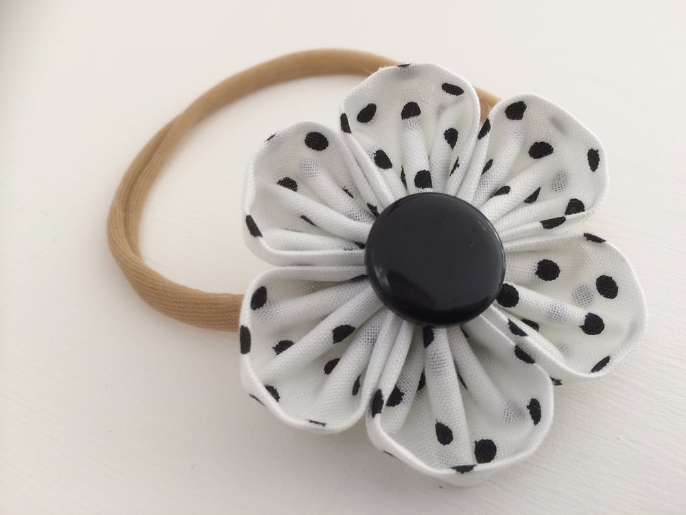 Image of Black and white polka dot flower