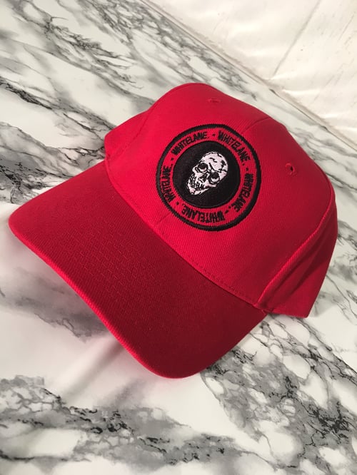 Image of Red skull emblem cap