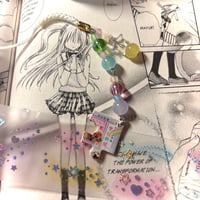 Image 3 of rainbow heisei retro puzzle piece phone charm