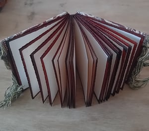 ARIÉ — reliure copte
