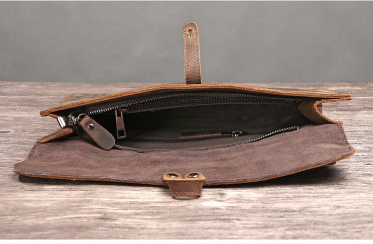Médor leather clutch bag