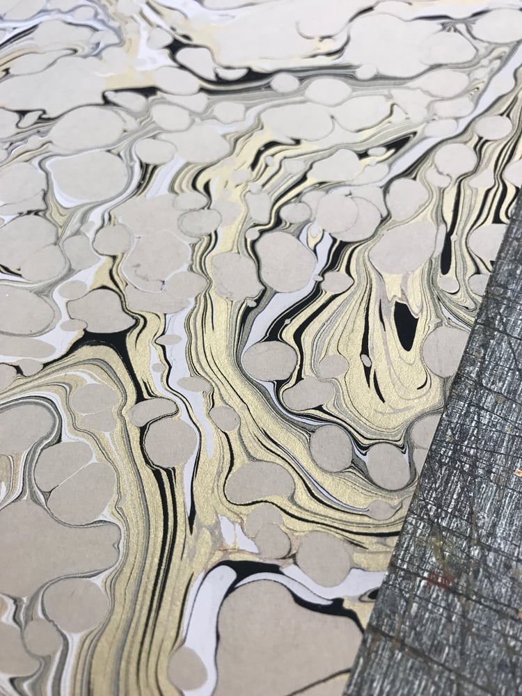 Image of Marbled Paper #85 'Gold, black and white vein' on Fawn 