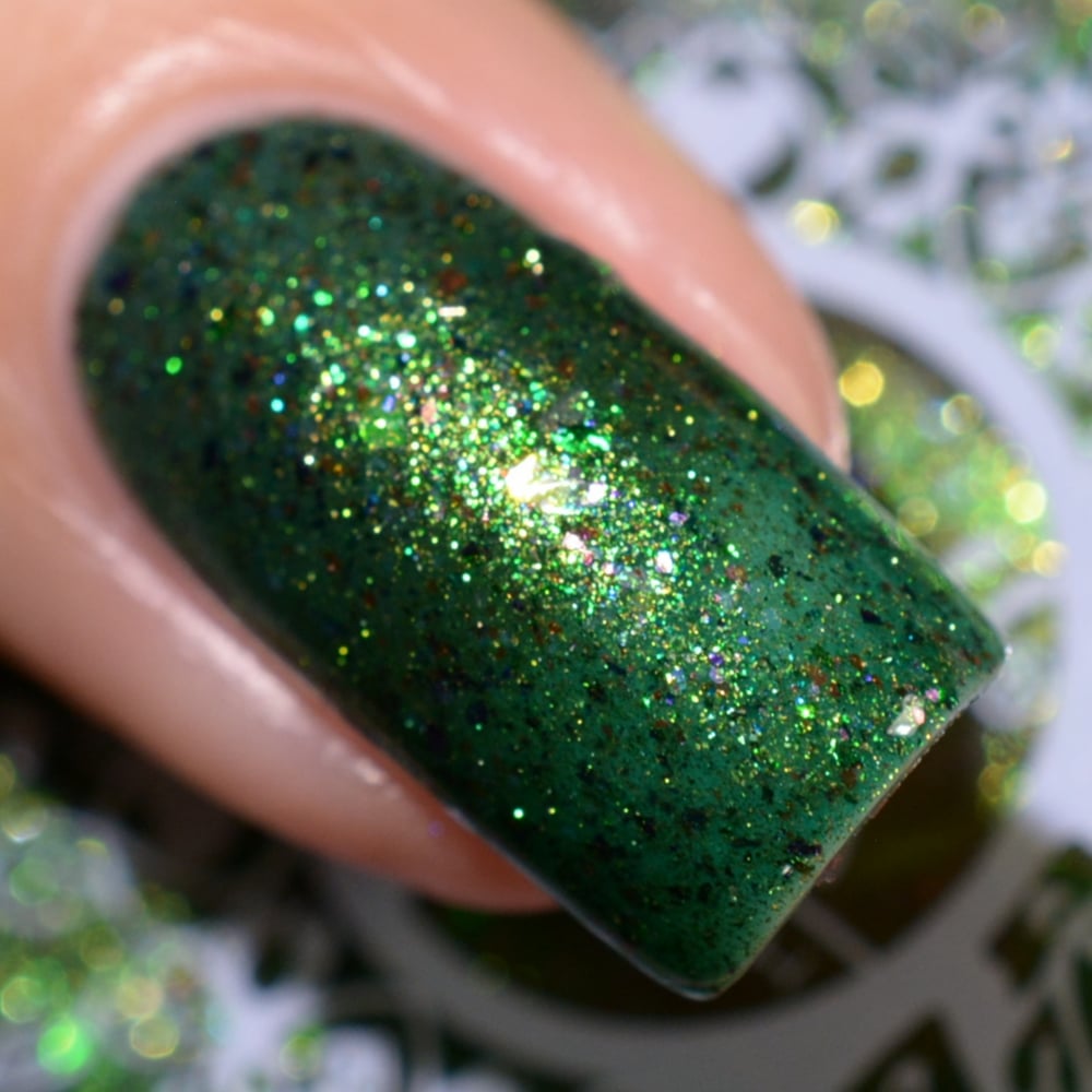Image of ~Perilous Prince~ is a teal green jelly w/opal, green & purple multichrome flakes!