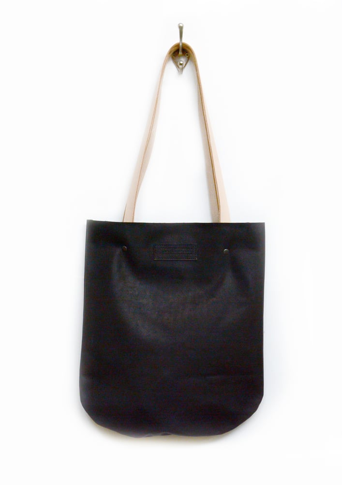 Image of Elegant, Curved Black Leather Tote Bag