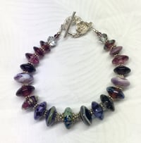 Image 1 of Purple disc bracelet