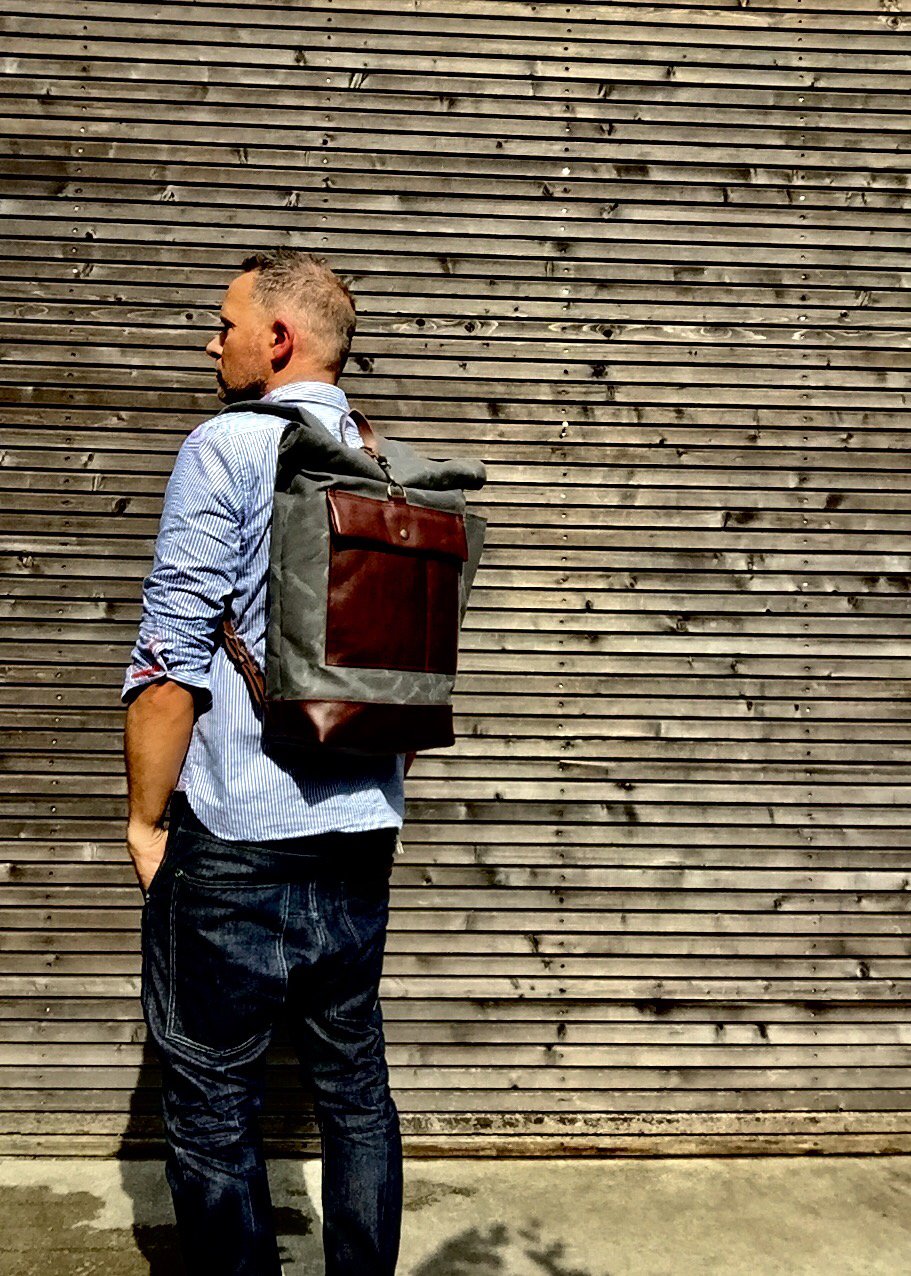 Image of Waxed canvas rucksack / backpack with roll up top and leather bottom and outside pocket COLLECTION U