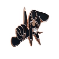 Image 1 of Black and gold soft enamel pin