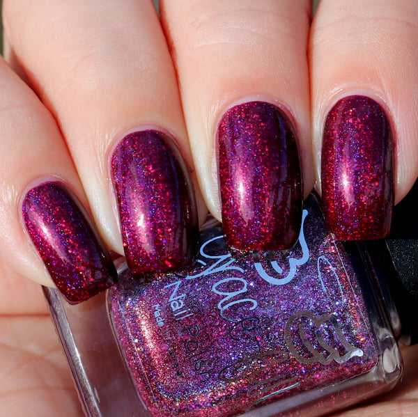 Image of Ghoulish Goop - a deep purple/pink with red undertones in a linear holo